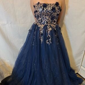 Cinderella Divine prom dress strapless adorned with floral appliques and sequins